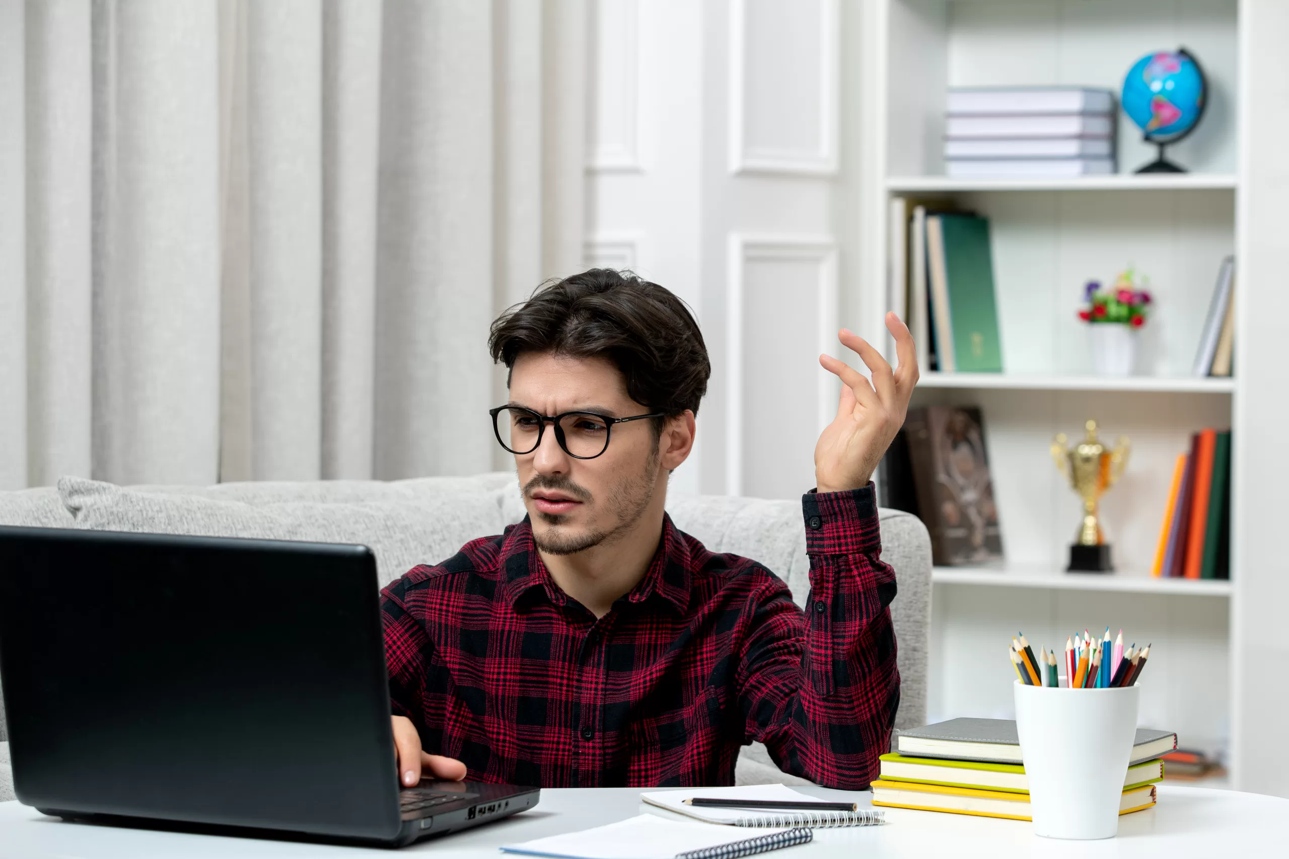 this image indicates a man seeing a laptop with interest and also it indicates a Are Online MBAs Valuable for Exploring DBA Courses